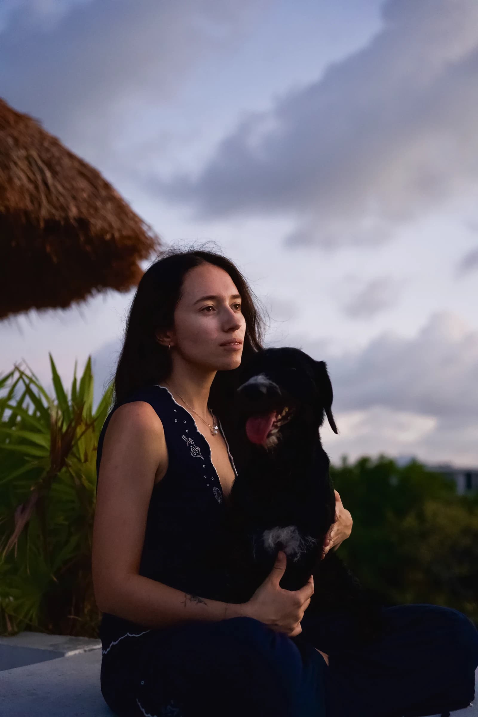 Elia Grimaud holding Poppy her dog